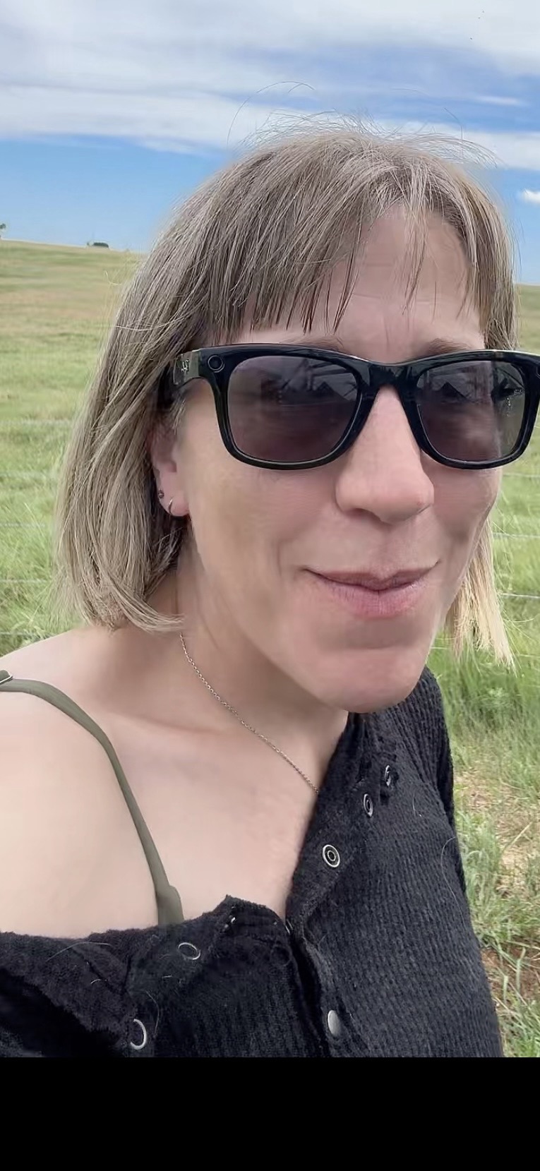 Rachel wearing Ray-Ban Meta smart glasses.
